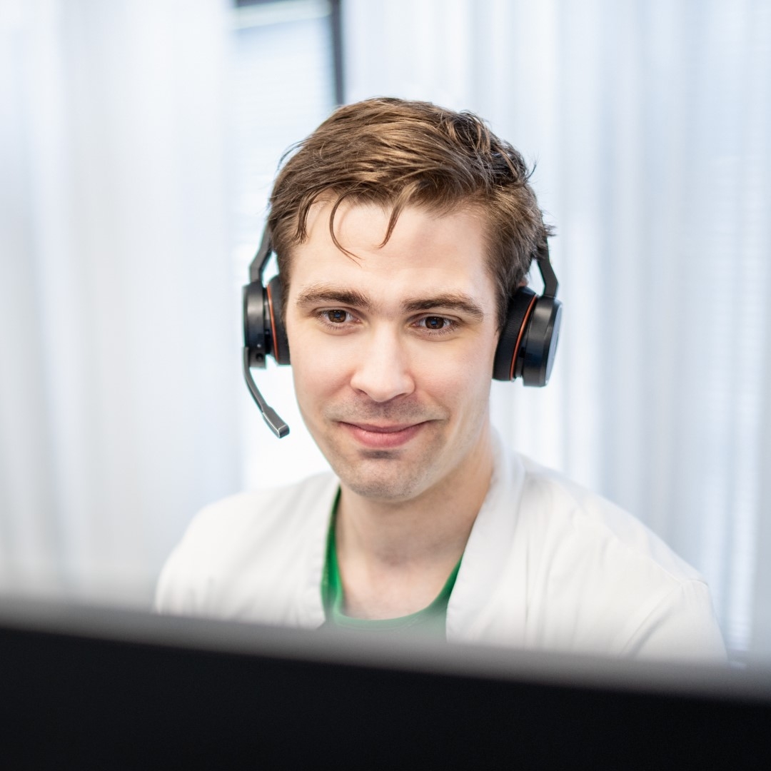 Med student working with a headset on.